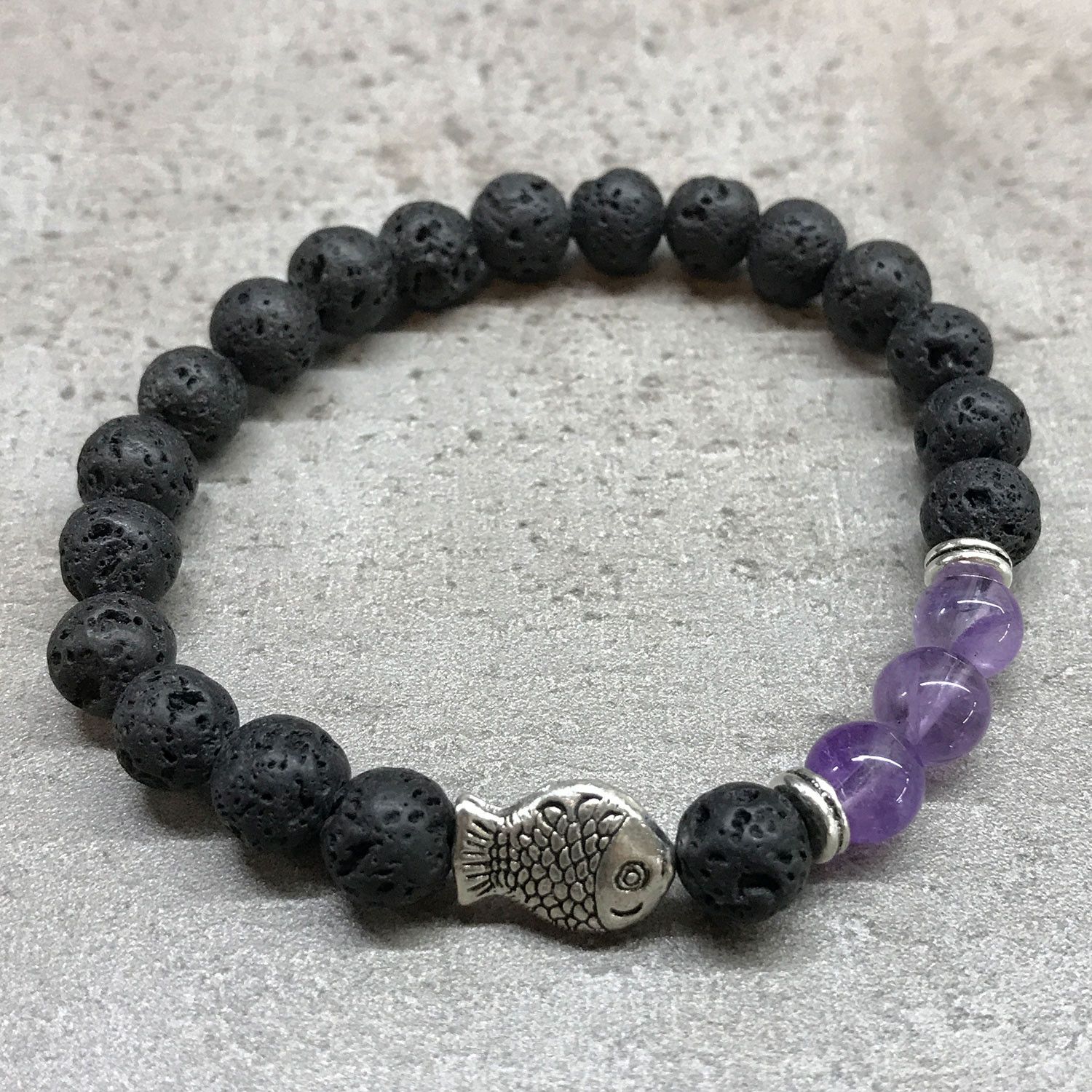 bG9jYWw6Ly9tZWRpYS85Si9HRS82MFIzMEMxRzZNVDNHRTlKLzg0YzBlYWY1LmpwZWc.jpg Lava Stone Bracelet - Fish Amethyst - Image 2