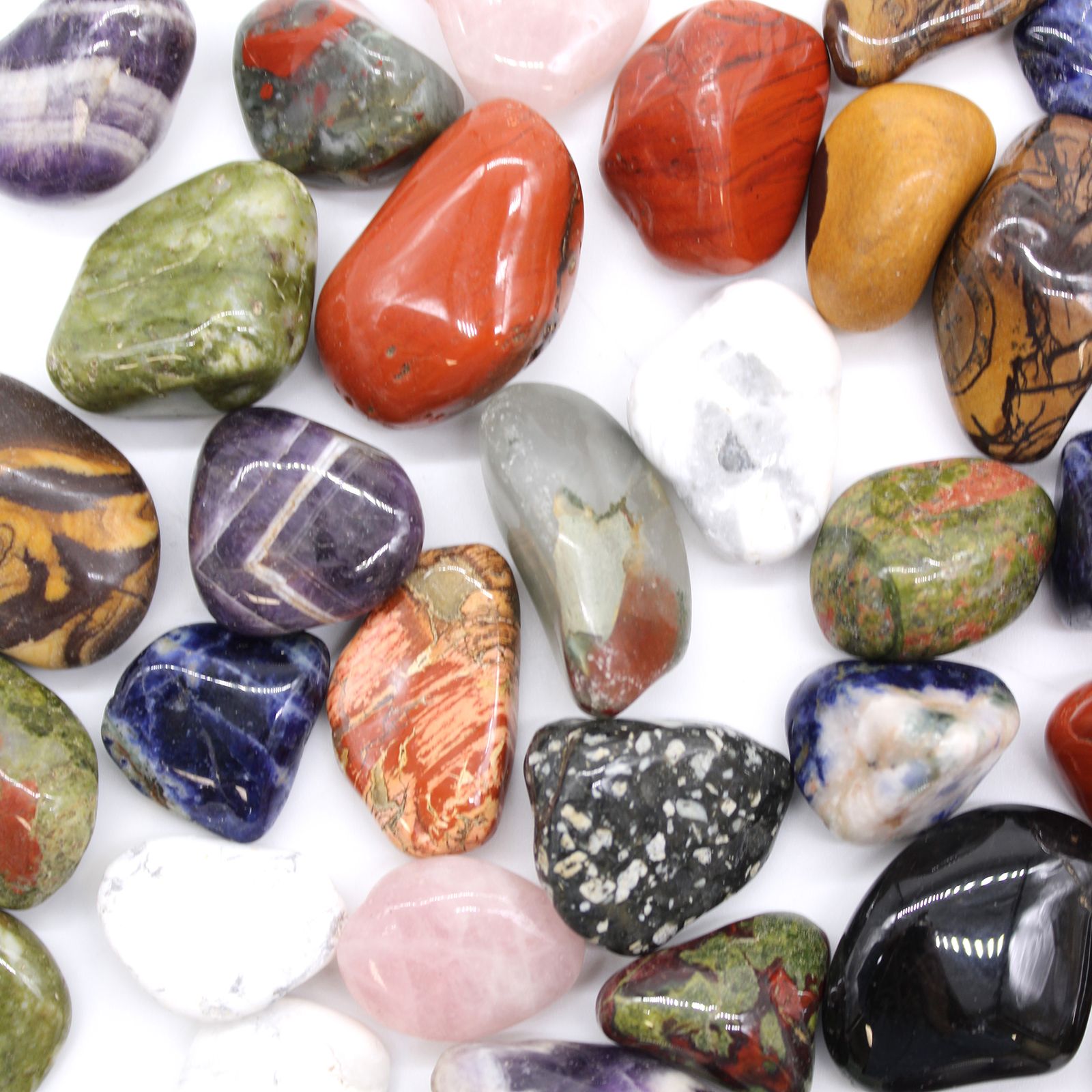 bG9jYWw6Ly9tZWRpYS8xUi9KRC82MFIzMEMxRzZSVEtKRDFSL2YzNDNhMjA2LmpwZWc-6.jpg Medium African Tumble Stones - Dragon Stones - Image 2