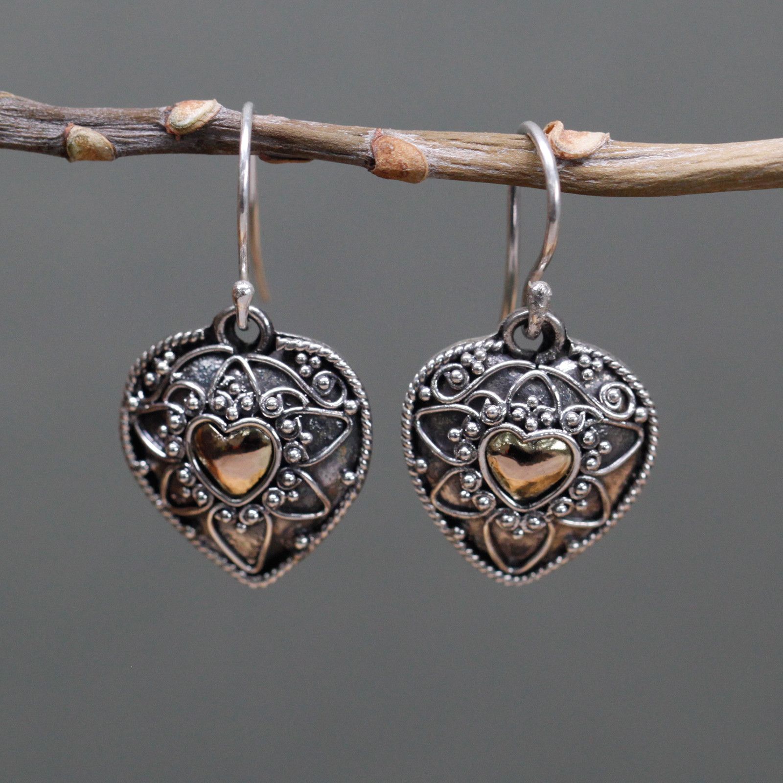 bG9jYWw6Ly9tZWRpYS9ITS9KQy82MFIzMEMxRzZNVEtKQ0hNL2ZlNmQzNmNkLmpwZWc.jpg Silver & Gold Earring - Mandala Hearts